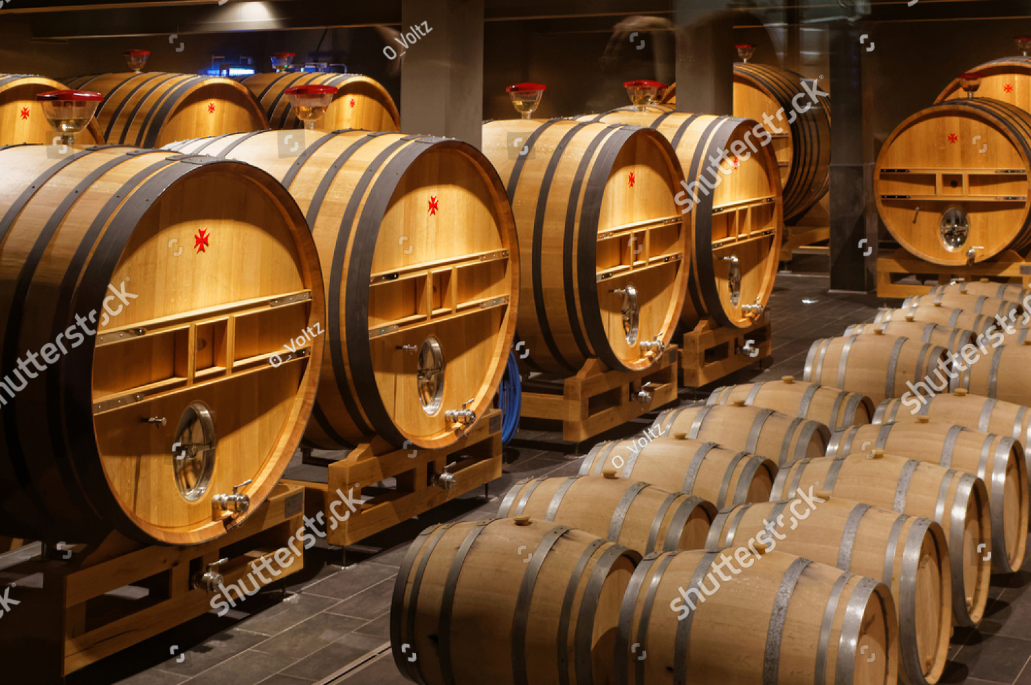stock-photo-oak-barrels-in-cellar-champagne-reims-france-748312468